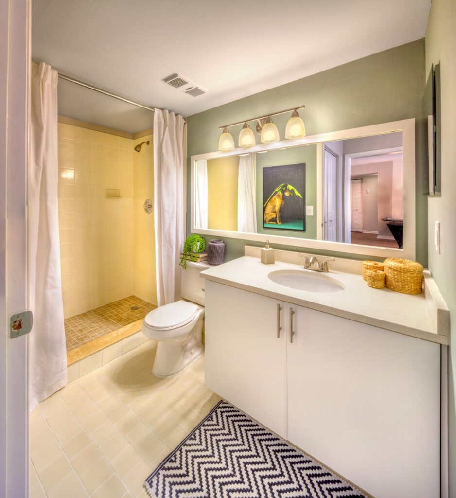 Bathroom with tile floor and stand alone shower